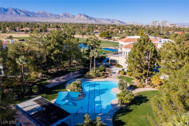 1613 Iron Ridge Dr, Las Vegas, NV 89117 - drone / aerial view of a pool and a water and mountain view