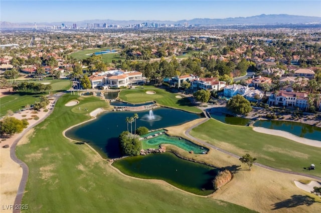 1613 Iron Ridge Dr, Las Vegas, NV 89117 - aerial view of property and surrounding area featuring a water and mountain view, a local golf course, and nearby suburban area