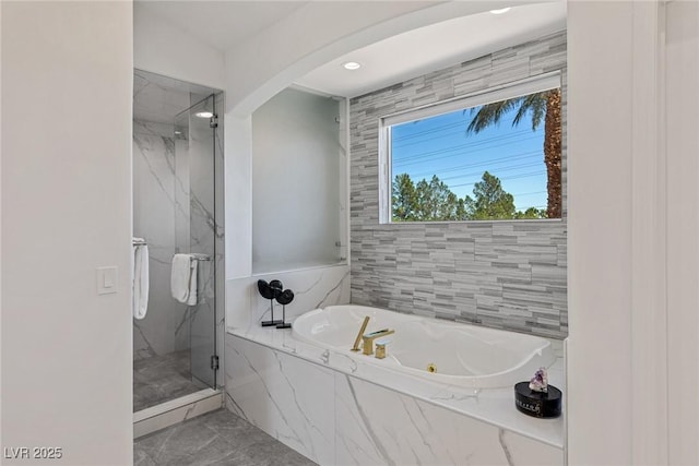 1613 Iron Ridge Dr, Las Vegas, NV 89117 - bathroom featuring a marble finish shower, marble finish flooring, and a bath