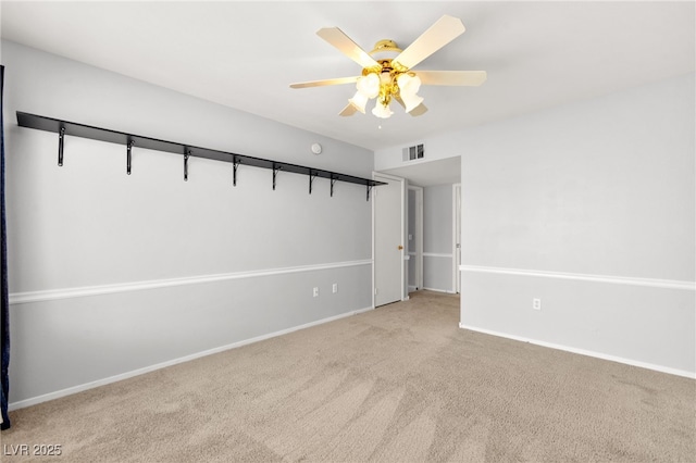 5710 E Tropicana Ave Unit 1035, Las Vegas, NV 89122 - carpeted empty room with a ceiling fan and baseboards