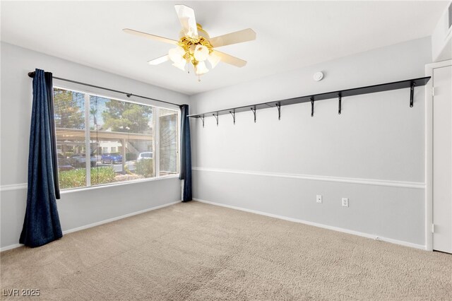 5710 E Tropicana Ave Unit 1035, Las Vegas, NV 89122 - carpeted spare room with a ceiling fan and a smoke detector