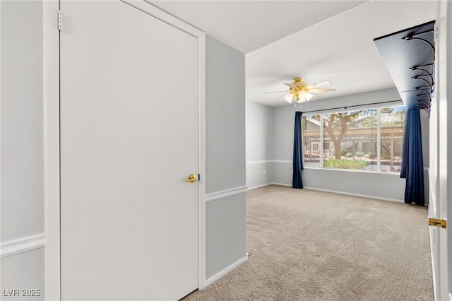 5710 E Tropicana Ave Unit 1035, Las Vegas, NV 89122 - carpeted spare room featuring a ceiling fan and baseboards