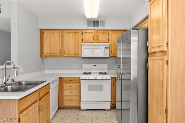 5710 E Tropicana Ave Unit 1035, Las Vegas, NV 89122 - kitchen with white appliances and light countertops