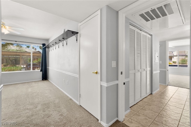 5710 E Tropicana Ave Unit 1035, Las Vegas, NV 89122 - corridor with carpet floors and plenty of natural light