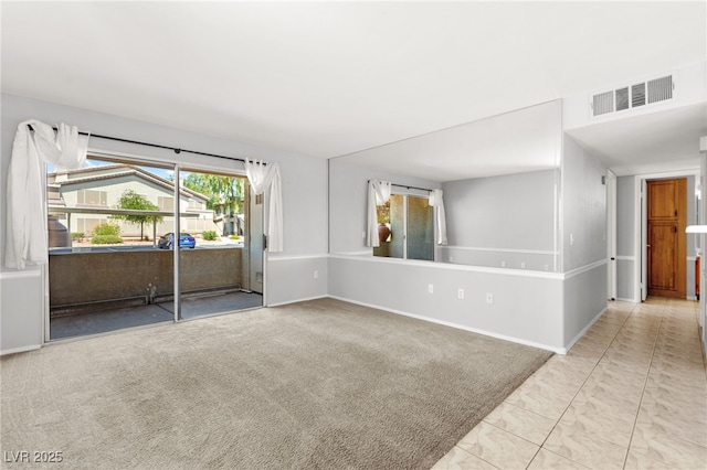5710 E Tropicana Ave Unit 1035, Las Vegas, NV 89122 - empty room featuring baseboards and carpet floors