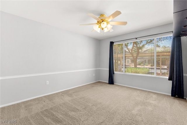5710 E Tropicana Ave Unit 1035, Las Vegas, NV 89122 - unfurnished room featuring carpet and a ceiling fan