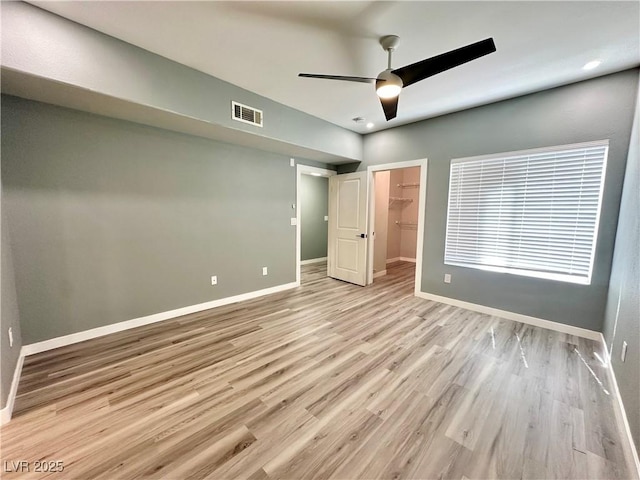 9000 Las Vegas Blvd Unit 1078, Las Vegas, NV 89123 - unfurnished bedroom with wood finished floors, a walk in closet, a ceiling fan, and recessed lighting