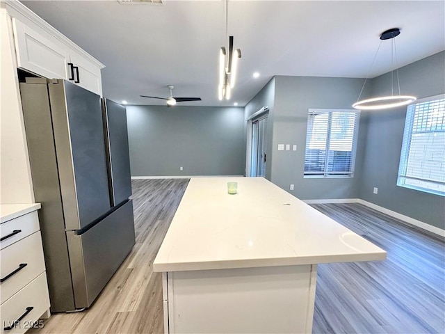 9000 Las Vegas Blvd Unit 1078, Las Vegas, NV 89123 - kitchen featuring freestanding refrigerator, open floor plan, and light wood-style flooring