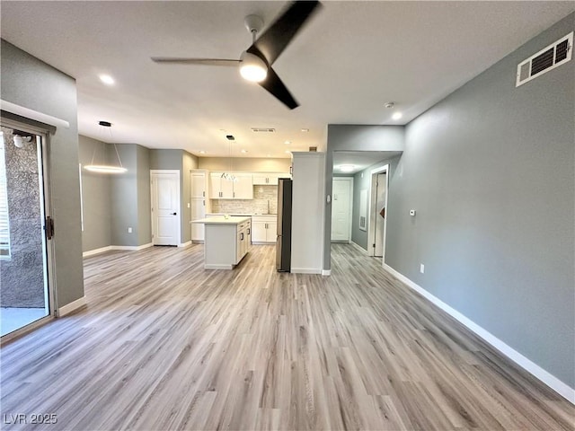 9000 Las Vegas Blvd Unit 1078, Las Vegas, NV 89123 - unfurnished living room with light wood-style flooring and a ceiling fan