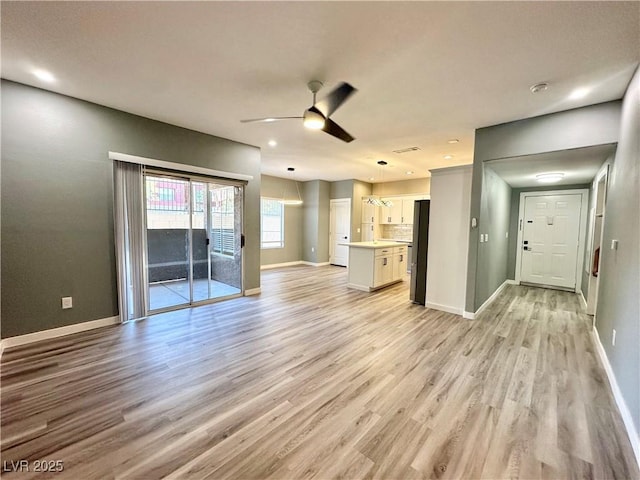 9000 Las Vegas Blvd Unit 1078, Las Vegas, NV 89123 - unfurnished living room featuring light wood-style floors, ceiling fan, and recessed lighting
