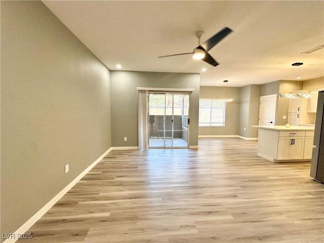 9000 Las Vegas Blvd Unit 1078, Las Vegas, NV 89123 - unfurnished living room with ceiling fan, light wood finished floors, and recessed lighting