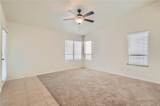 3308 Morning Wind Ln, Las Vegas, NV 89129 - unfurnished room featuring a ceiling fan, light carpet, and light tile patterned floors