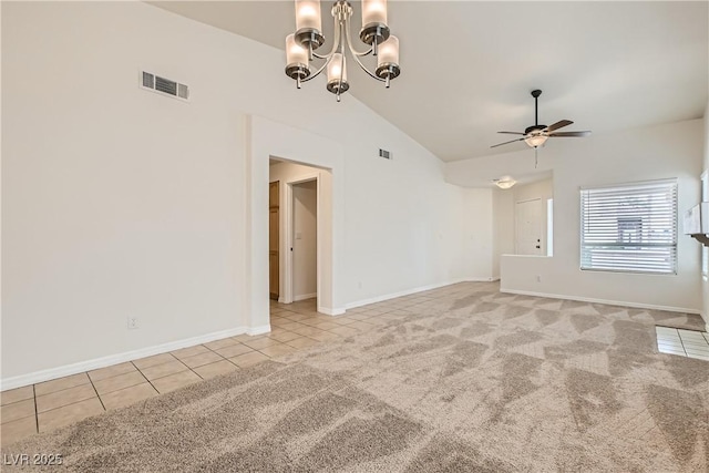 3308 Morning Wind Ln, Las Vegas, NV 89129 - empty room with vaulted ceiling, light tile patterned floors, a ceiling fan, light colored carpet, and a chandelier