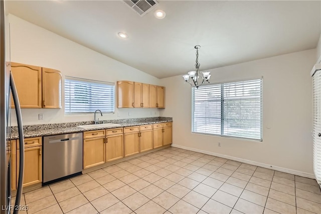 3308 Morning Wind Ln, Las Vegas, NV 89129 - kitchen with dishwasher, light brown cabinets, a chandelier, lofted ceiling, and light stone countertops
