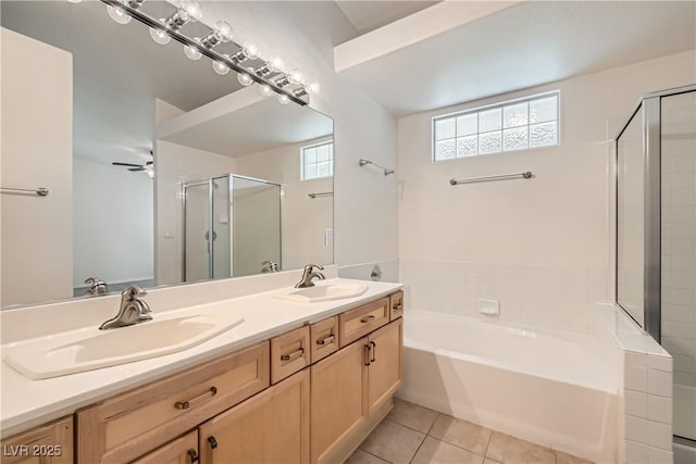 3308 Morning Wind Ln, Las Vegas, NV 89129 - full bath with a garden tub, double vanity, a stall shower, tile patterned floors, and a ceiling fan