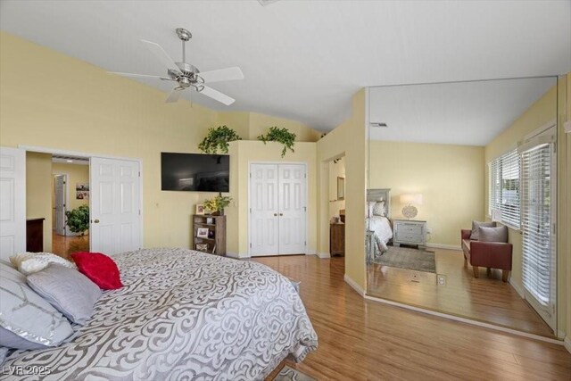 2408 Sunset Beach Ln, Las Vegas, NV 89128 - bedroom featuring wood finished floors, lofted ceiling, a closet, and a ceiling fan