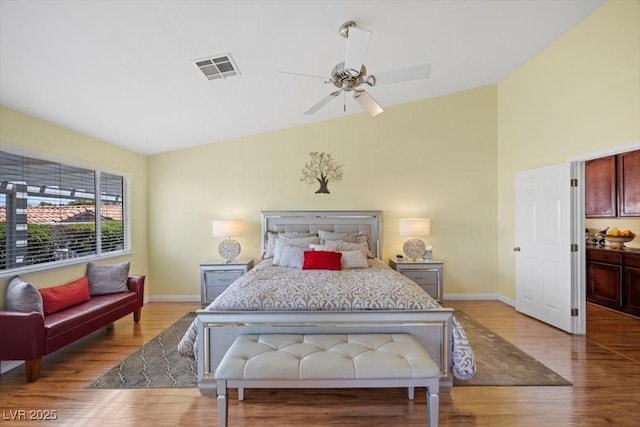 2408 Sunset Beach Ln, Las Vegas, NV 89128 - bedroom with wood finished floors, vaulted ceiling, and ceiling fan