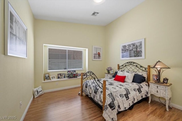 2408 Sunset Beach Ln, Las Vegas, NV 89128 - bedroom with wood finished floors and baseboards