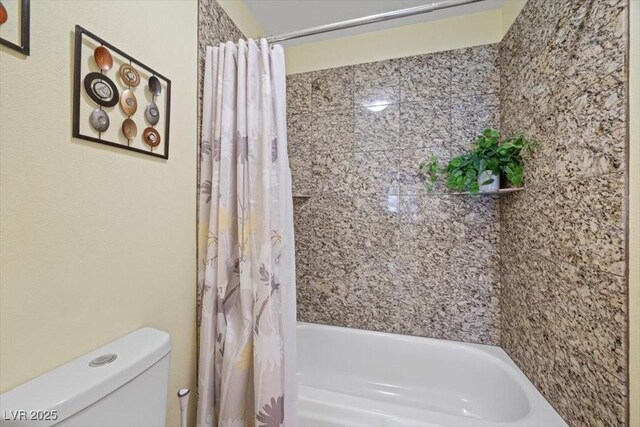 2408 Sunset Beach Ln, Las Vegas, NV 89128 - bathroom featuring shower / tub combo and toilet