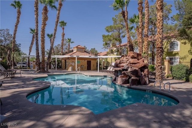 7950 W Flamingo Rd Unit 1009, Las Vegas, NV 89147 - community pool featuring a patio area