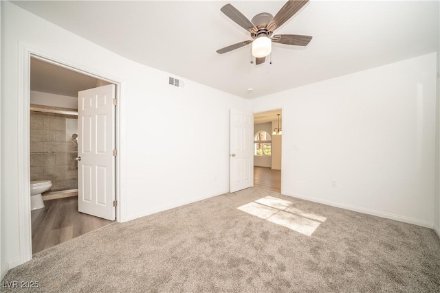 7950 W Flamingo Rd Unit 1009, Las Vegas, NV 89147 - unfurnished bedroom featuring carpet floors, ceiling fan, and ensuite bathroom