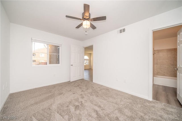 7950 W Flamingo Rd Unit 1009, Las Vegas, NV 89147 - carpeted spare room with ceiling fan and baseboards