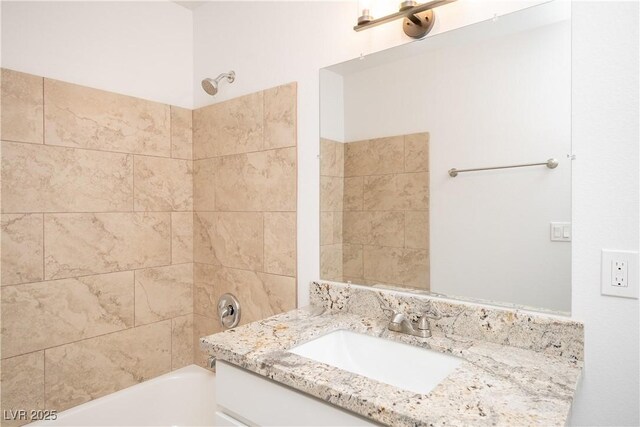 7950 W Flamingo Rd Unit 1009, Las Vegas, NV 89147 - bathroom featuring vanity and shower / bathtub combination