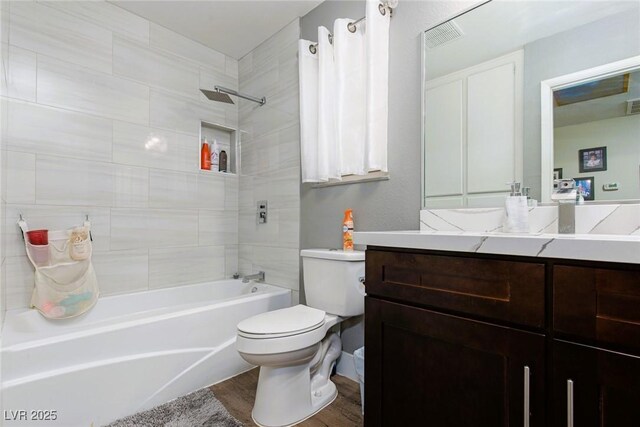 6457 Celeste Ave, Las Vegas, NV 89107 - full bath featuring washtub / shower combination, wood finished floors, and vanity