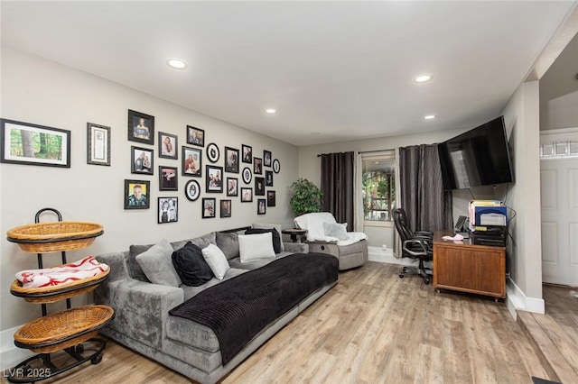 6457 Celeste Ave, Las Vegas, NV 89107 - living room featuring light wood-style floors, recessed lighting, and an office area