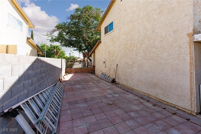 6457 Celeste Ave, Las Vegas, NV 89107 - view of home's exterior featuring stucco siding and a patio area