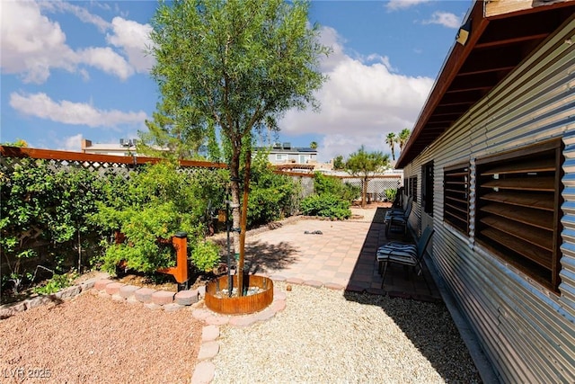 6457 Celeste Ave, Las Vegas, NV 89107 - fenced backyard with a patio area