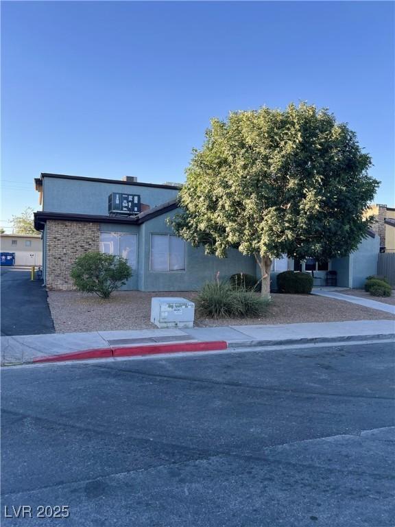1420 Hialeah Dr Unit D, Las Vegas, NV 89119 - view of front of property with stucco siding
