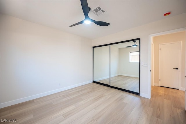 4594 Cabo Ln, Las Vegas, NV 89121 - unfurnished bedroom with light wood-type flooring, a closet, and ceiling fan