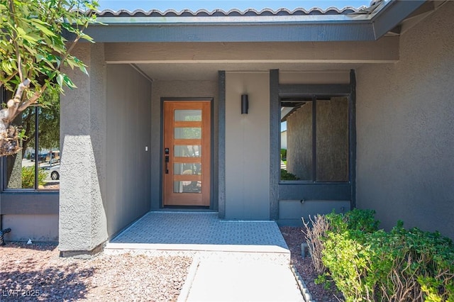 4594 Cabo Ln, Las Vegas, NV 89121 - property entrance featuring stucco siding and a tiled roof