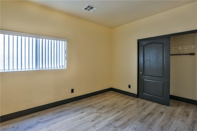 235 Calvino Ave, Las Vegas, NV 89183 - unfurnished bedroom with light wood-style flooring and a closet