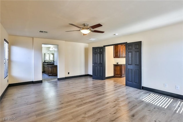 235 Calvino Ave, Las Vegas, NV 89183 - spare room featuring light wood-style floors and a ceiling fan