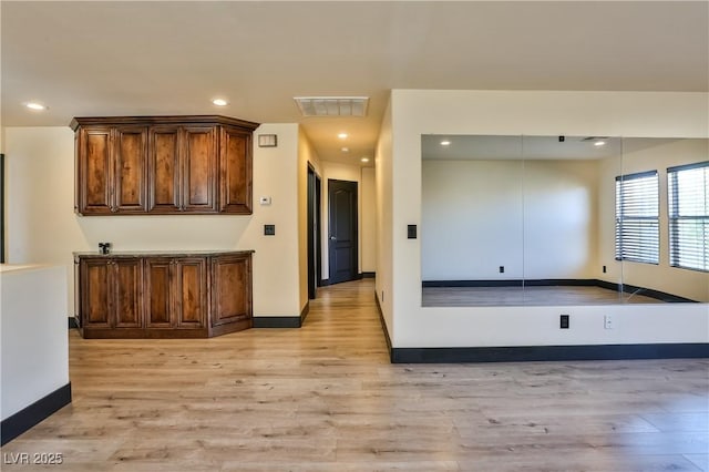 235 Calvino Ave, Las Vegas, NV 89183 - kitchen with light wood-style floors and recessed lighting