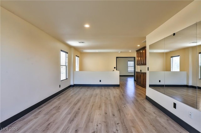 235 Calvino Ave, Las Vegas, NV 89183 - unfurnished room with light wood-type flooring, healthy amount of natural light, and recessed lighting