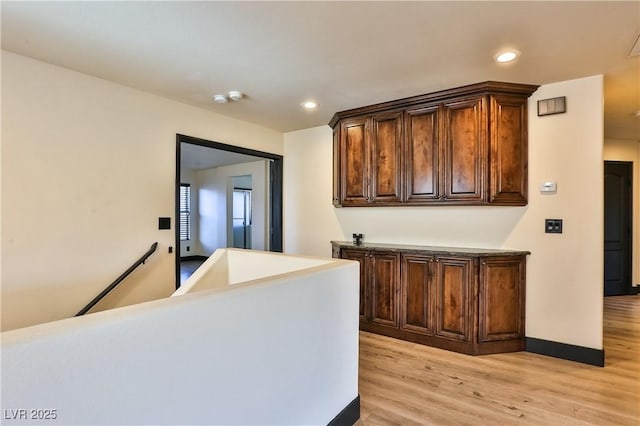 235 Calvino Ave, Las Vegas, NV 89183 - bar featuring light wood-type flooring and recessed lighting