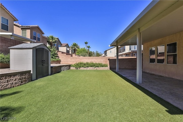 235 Calvino Ave, Las Vegas, NV 89183 - view of yard with a storage unit and a patio