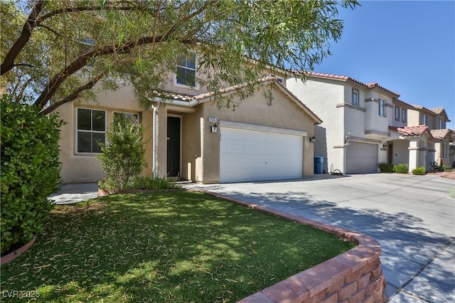 235 Calvino Ave, Las Vegas, NV 89183 - view of front of home with driveway, stucco siding, a tile roof, and a garage