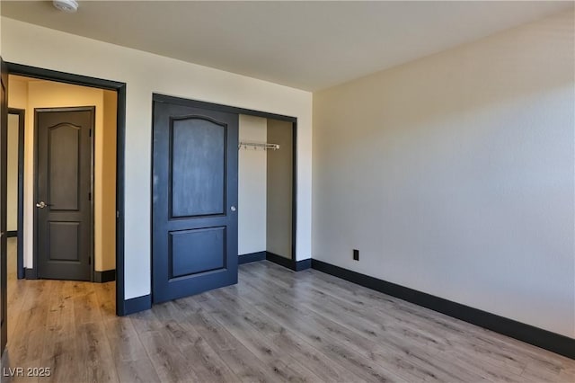 235 Calvino Ave, Las Vegas, NV 89183 - unfurnished bedroom with light wood-style flooring and a closet