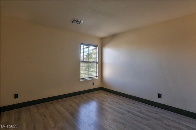 235 Calvino Ave, Las Vegas, NV 89183 - empty room featuring wood finished floors and baseboards