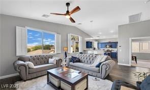 11018 Salernes St, Las Vegas, NV 89141 - living room with ceiling fan, wood finished floors, and lofted ceiling