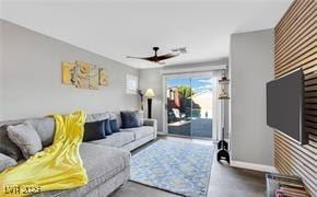 11018 Salernes St, Las Vegas, NV 89141 - living area with baseboards and a ceiling fan