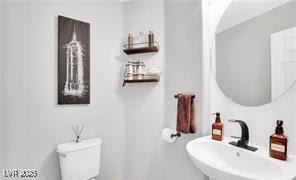 11018 Salernes St, Las Vegas, NV 89141 - bathroom with a sink and toilet