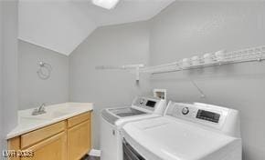 11018 Salernes St, Las Vegas, NV 89141 - laundry room featuring washing machine and clothes dryer and cabinet space