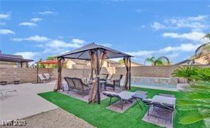 11018 Salernes St, Las Vegas, NV 89141 - fenced backyard with a patio and a gazebo