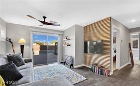 11018 Salernes St, Las Vegas, NV 89141 - living area with wood finished floors and a ceiling fan