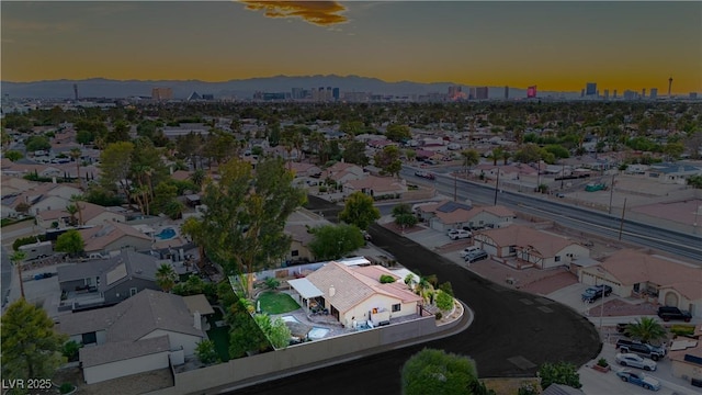3227 Paintedhills Ave, Las Vegas, NV 89120 - aerial view at dusk of a city view and a mountain view